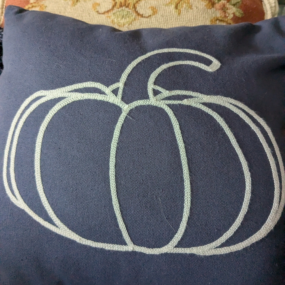 Blue/Navy Colored Throw Pillow with White Pumpkin Design